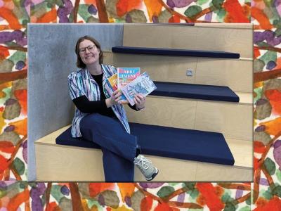 Line med en stak bøger